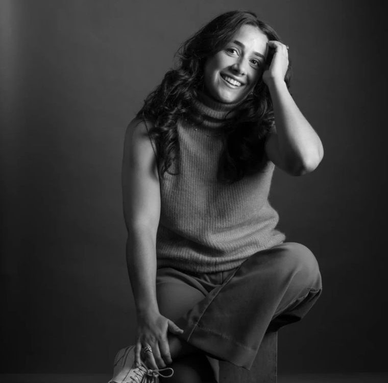 Black and white studio portrait of Annamarie Galante